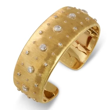 Buccellati classic diamond cuff set in their famous fabric-like textured yellow gold.