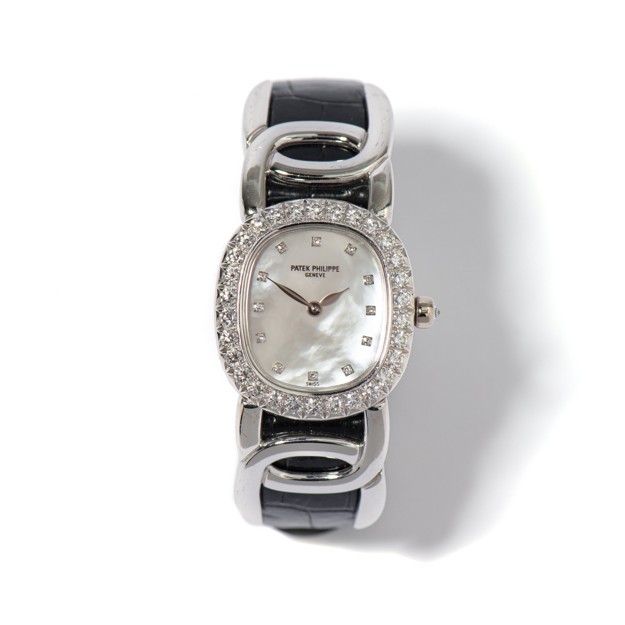 Vintage ladies Patek Philippe watch with mother of pearl face, diamond dial, and diamond bezel - WAMD-107162