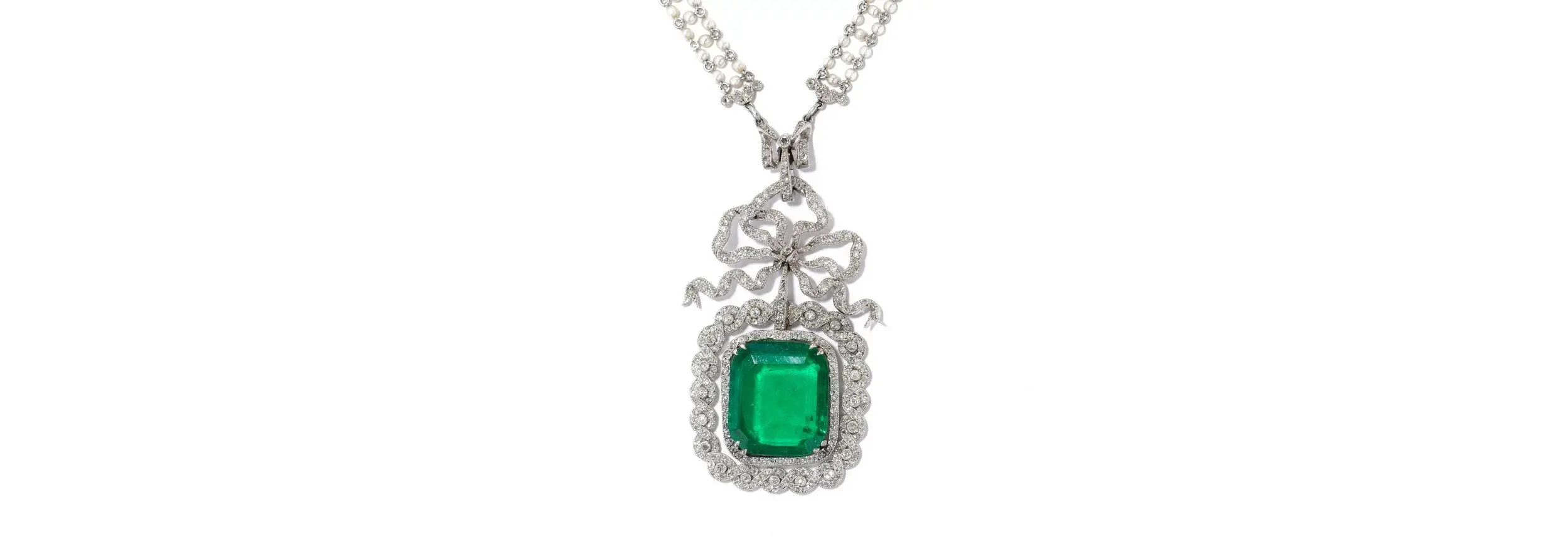  A Belle Epoch era Cartier pendant necklace with 9.41ct portrait cut Colombian emerald and diamond and pearl accents. 