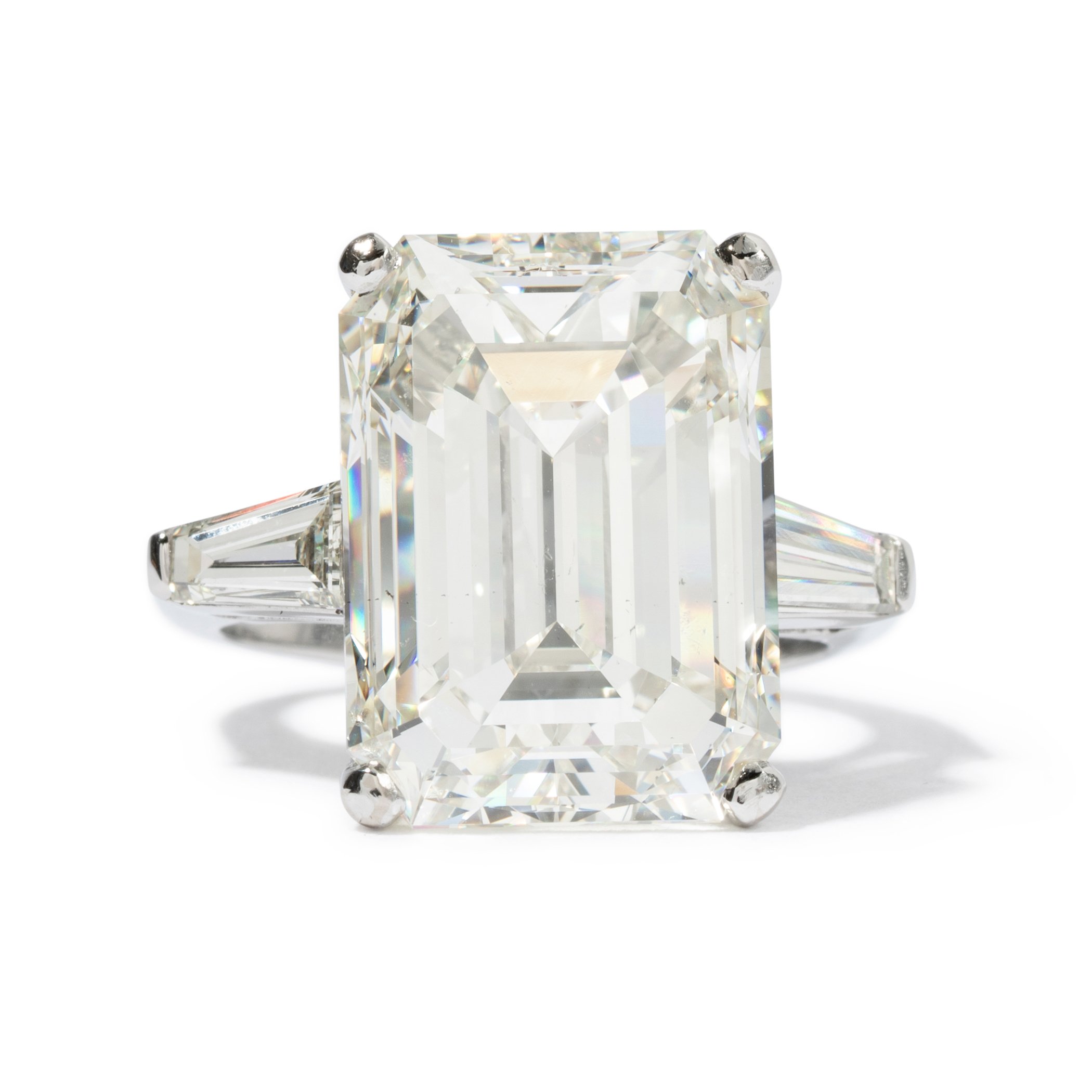  This emerald cut diamond weighs 14.64 carats with J color and SI1 grading. This stone is an example that was cut with size as the priority. 